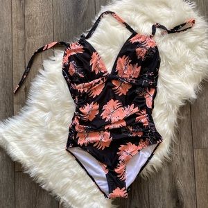 Brand new without tags/never worn swim suit. Hygienic liner still attached.